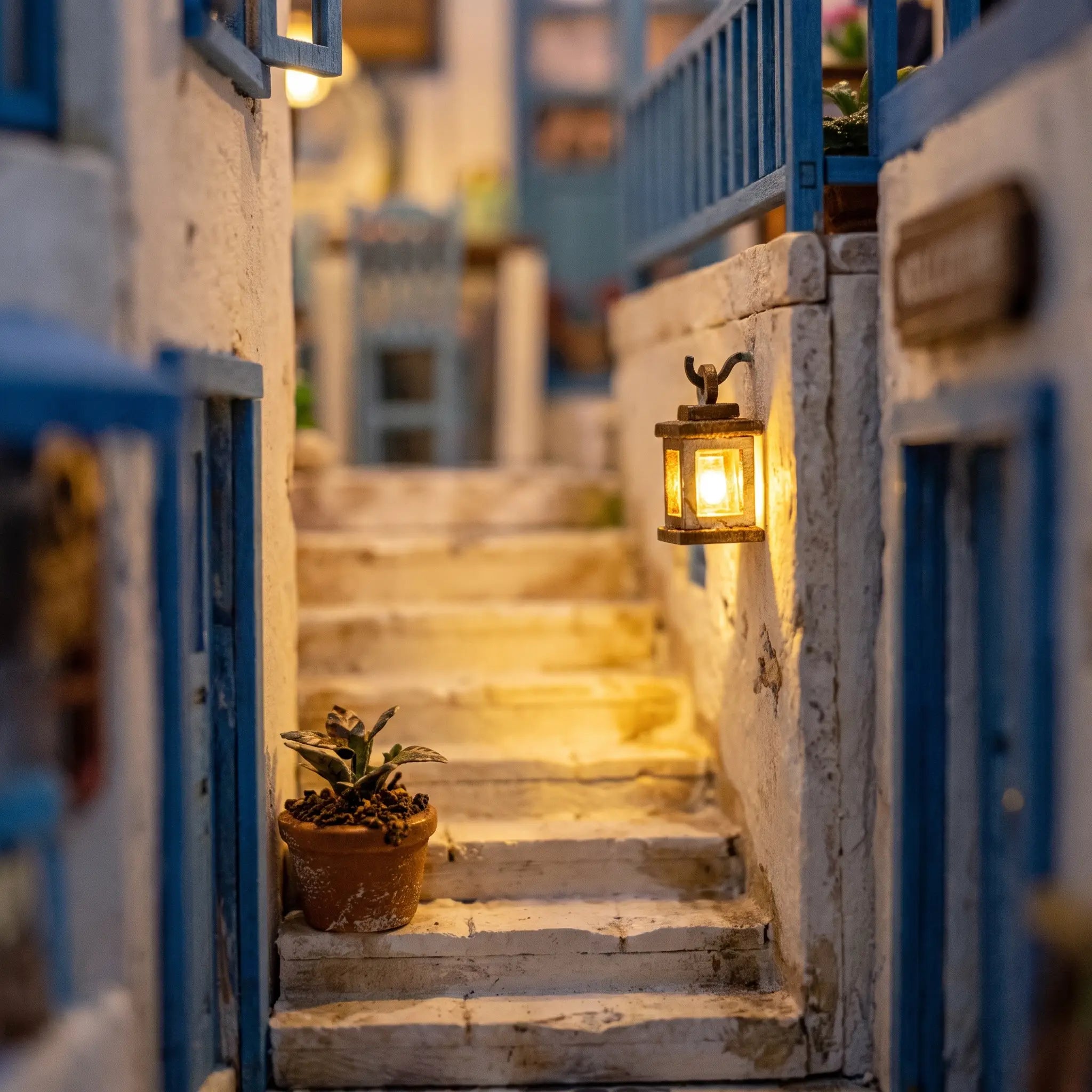 Close-up of the whitewashed stone steps inside The Aegean Alley miniature book nook