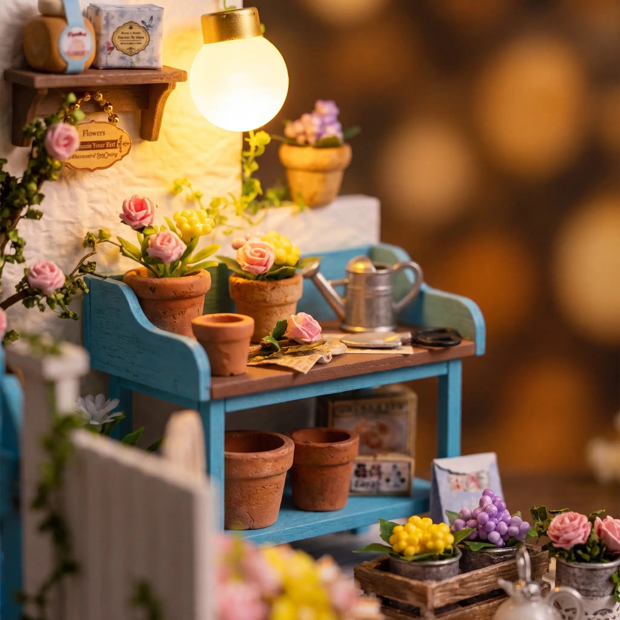 Close-up of the lit potting bench with flowers