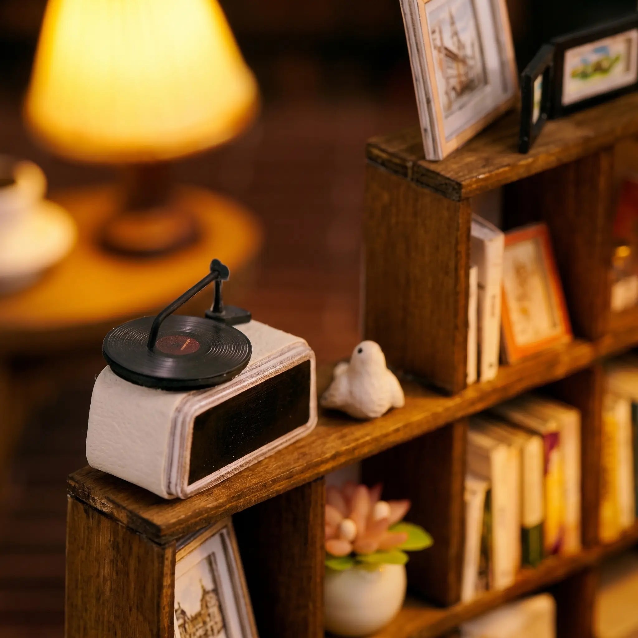 Close-up of the white record player on the bookshelf in The Quiet Corner
