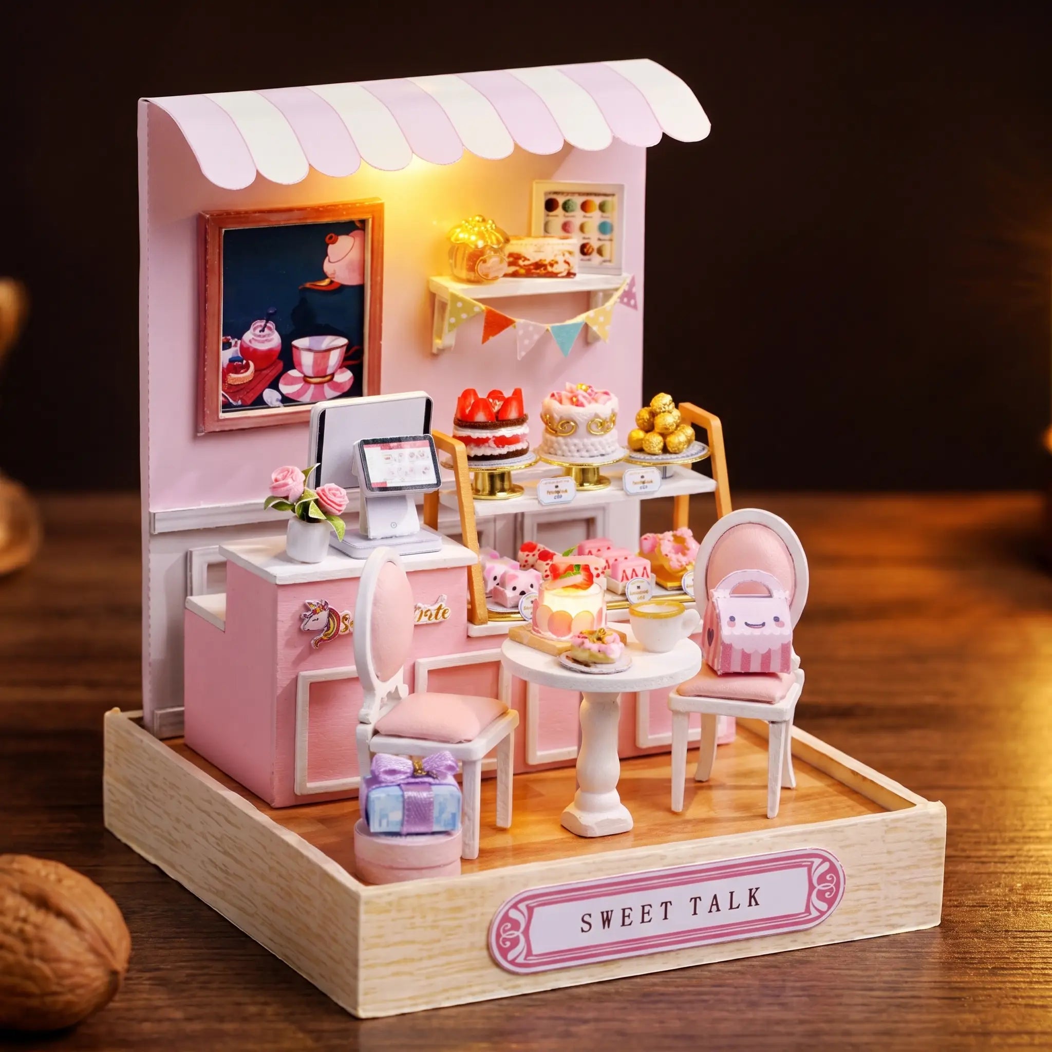 The Cake Shop lit on a dark walnut backdrop