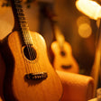 Close-up of the acoustic guitar and ukulele in The Sunday Lounge