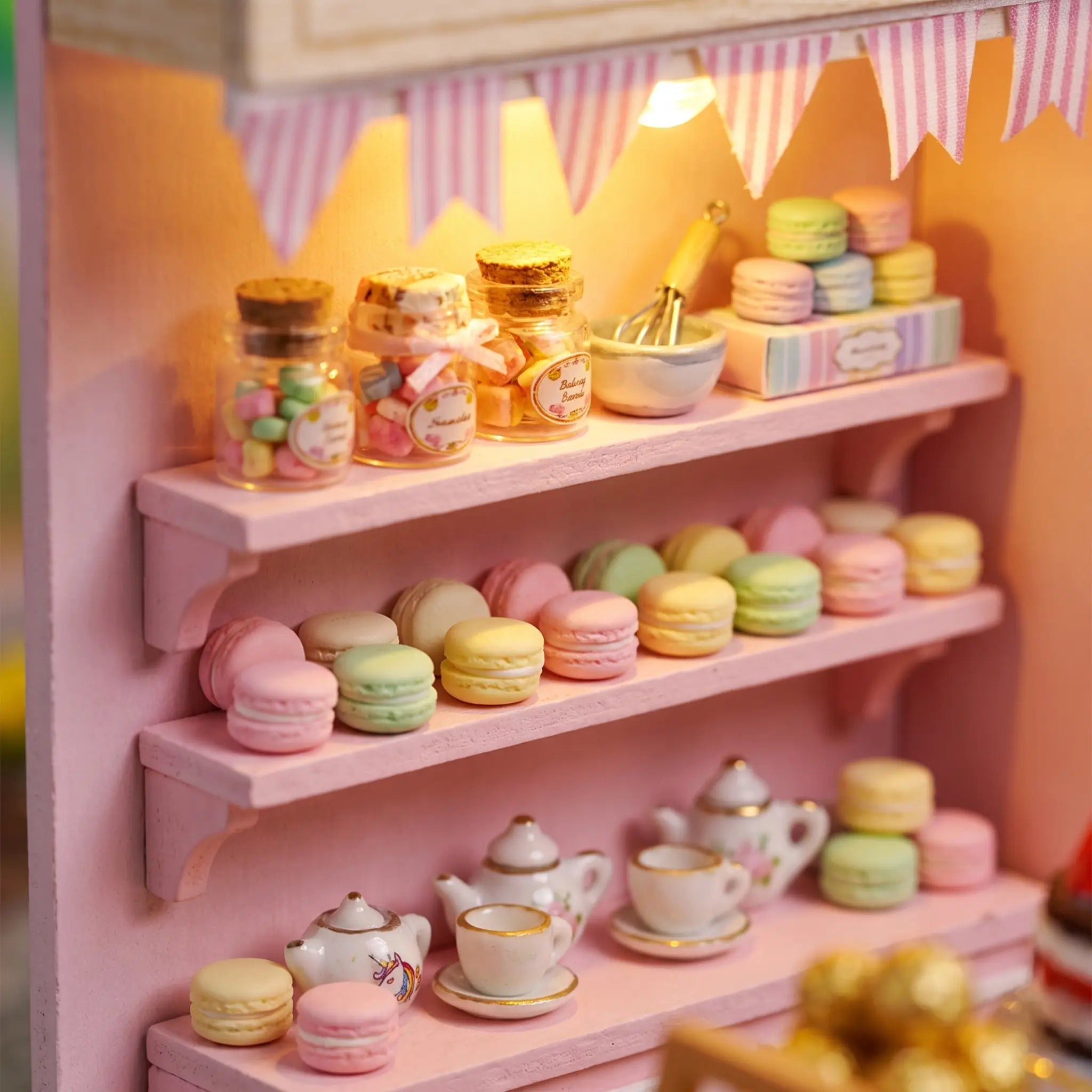 Close-up of the treat and teapot shelves inside The Cake Shop