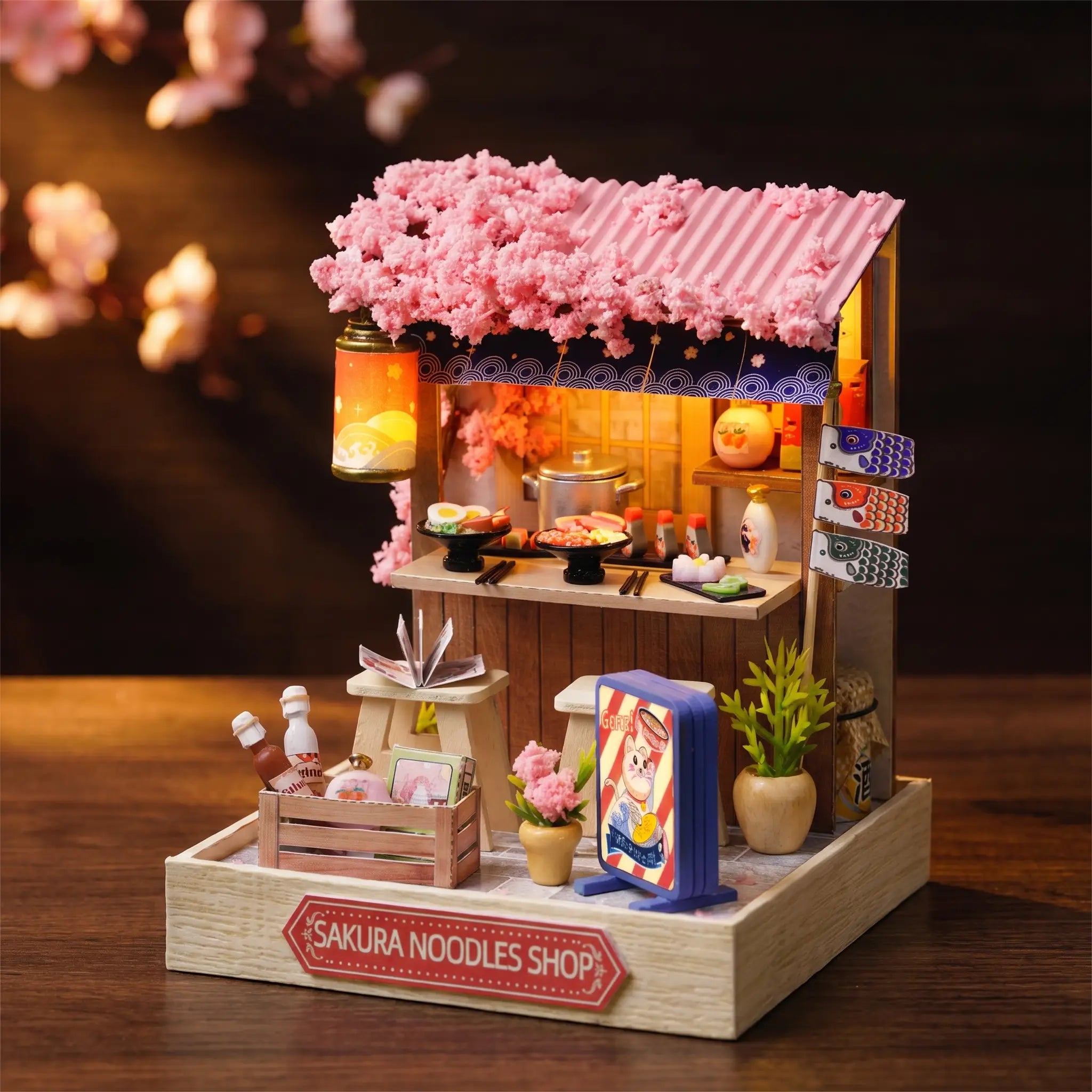 The Ramen Stall lit on a dark walnut backdrop, warm lantern glow