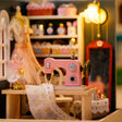 Close-up of the lit pink sewing machine and lace inside The Sewing Corner