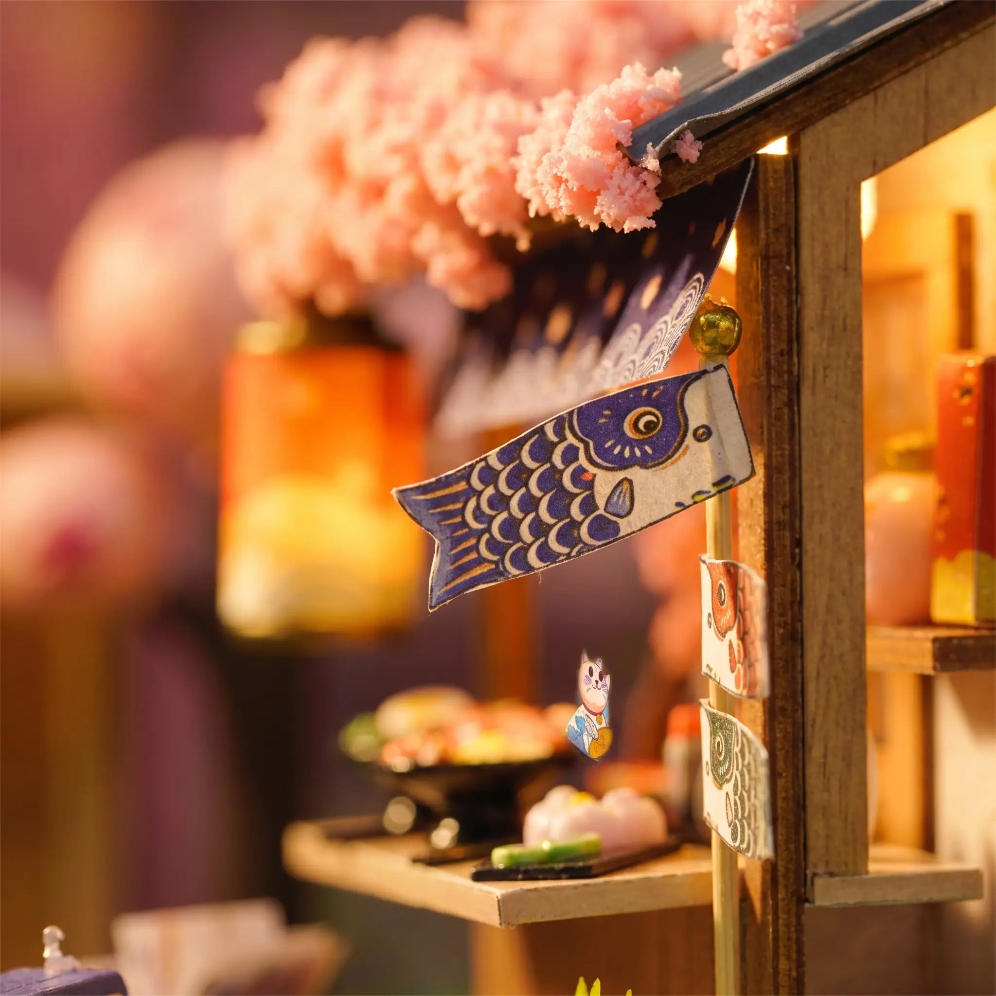 Close-up of the blue koi-carp streamer flags by the stall