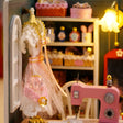 Close-up of the lace-draped dress form mannequin in The Sewing Corner