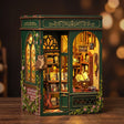 The Owl Bookshop lit interior on a dark walnut backdrop, glowing stained-glass windows