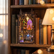 The Zodiac Chamber book nook lit on a bookshelf at dusk