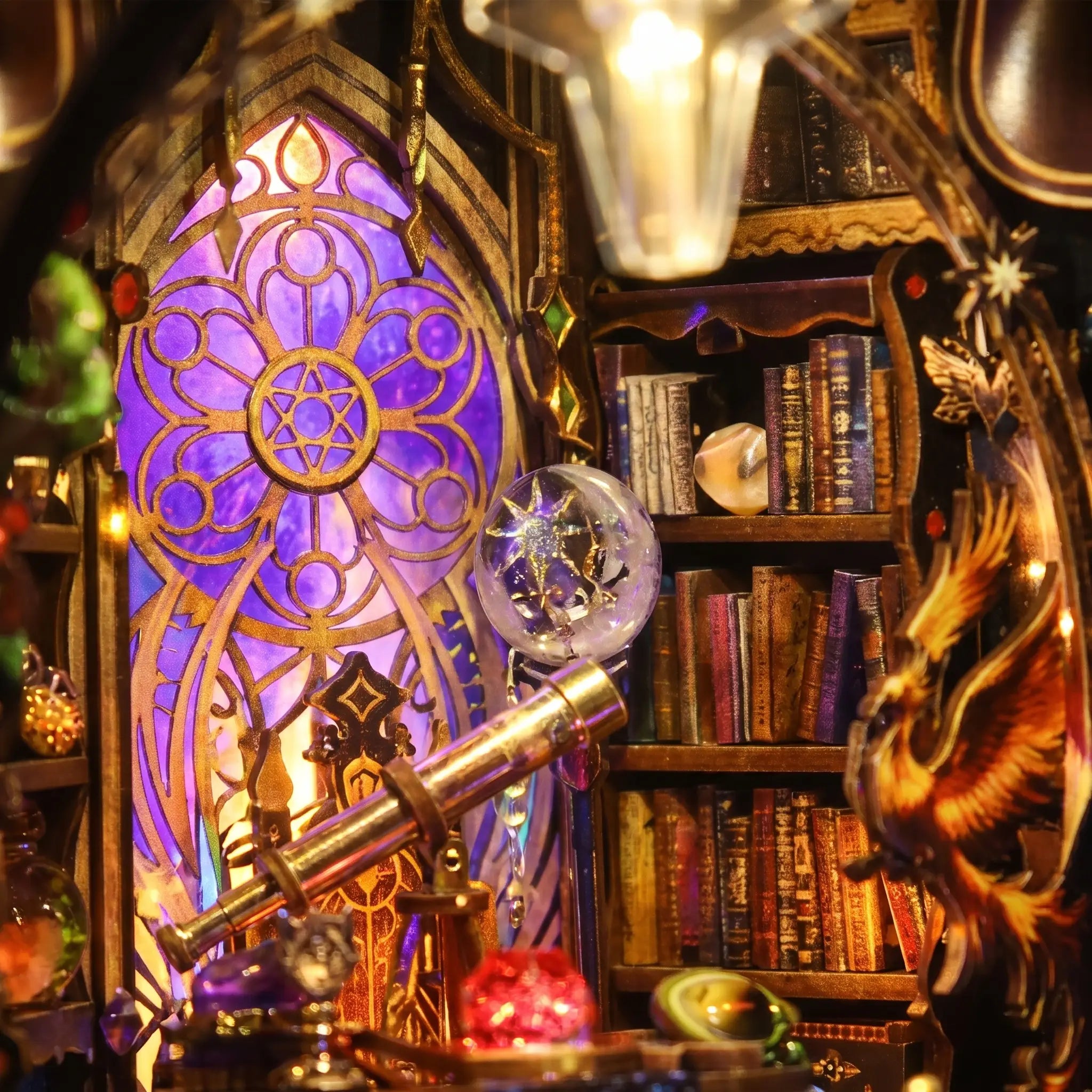 Close-up of the glowing zodiac window and telescope inside The Zodiac Chamber