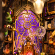 Close-up of the glowing stained-glass zodiac rose window