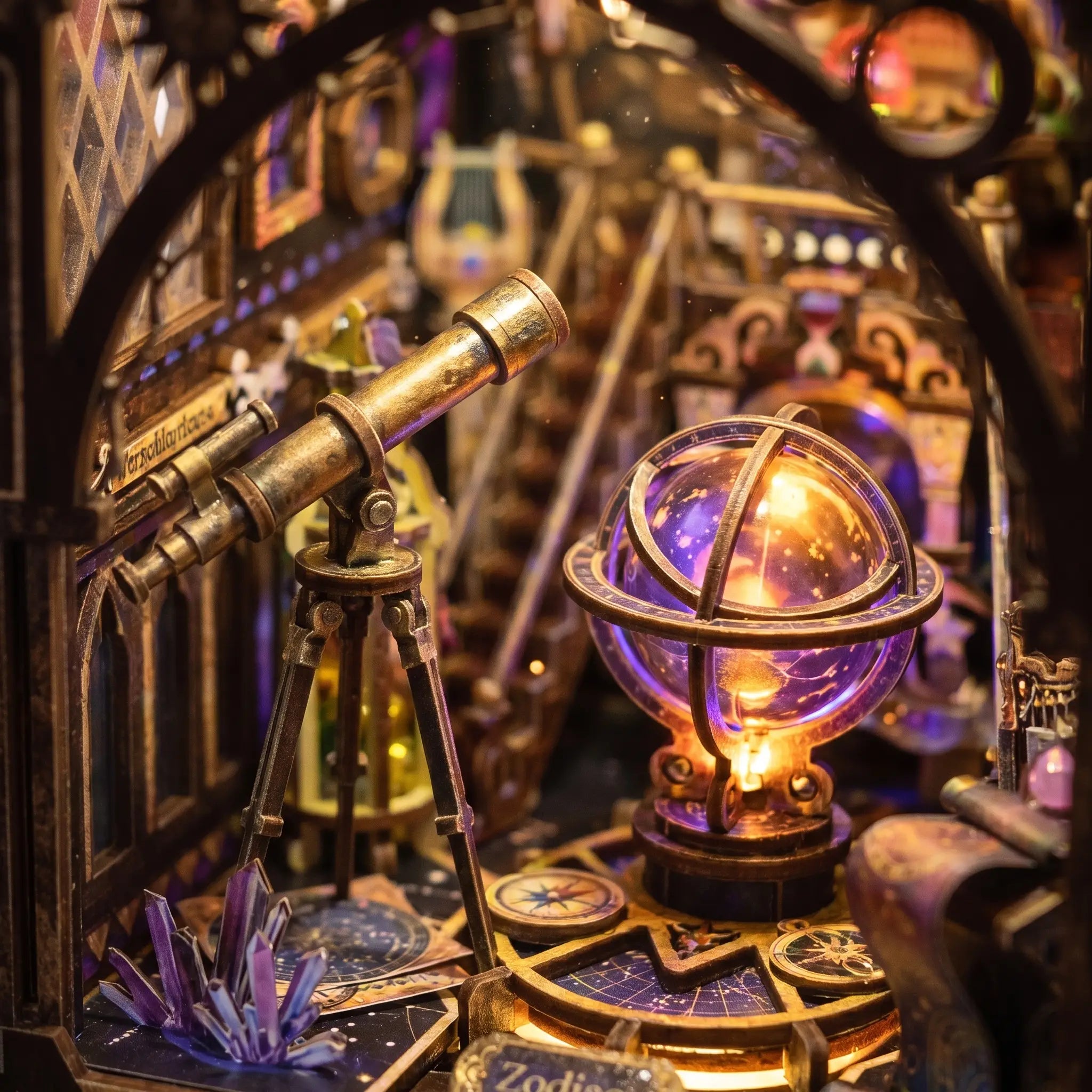 Close-up of the brass telescope and glowing orrery inside The Zodiac Chamber