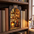 The Cat's Study book nook slotted on a shelf between books