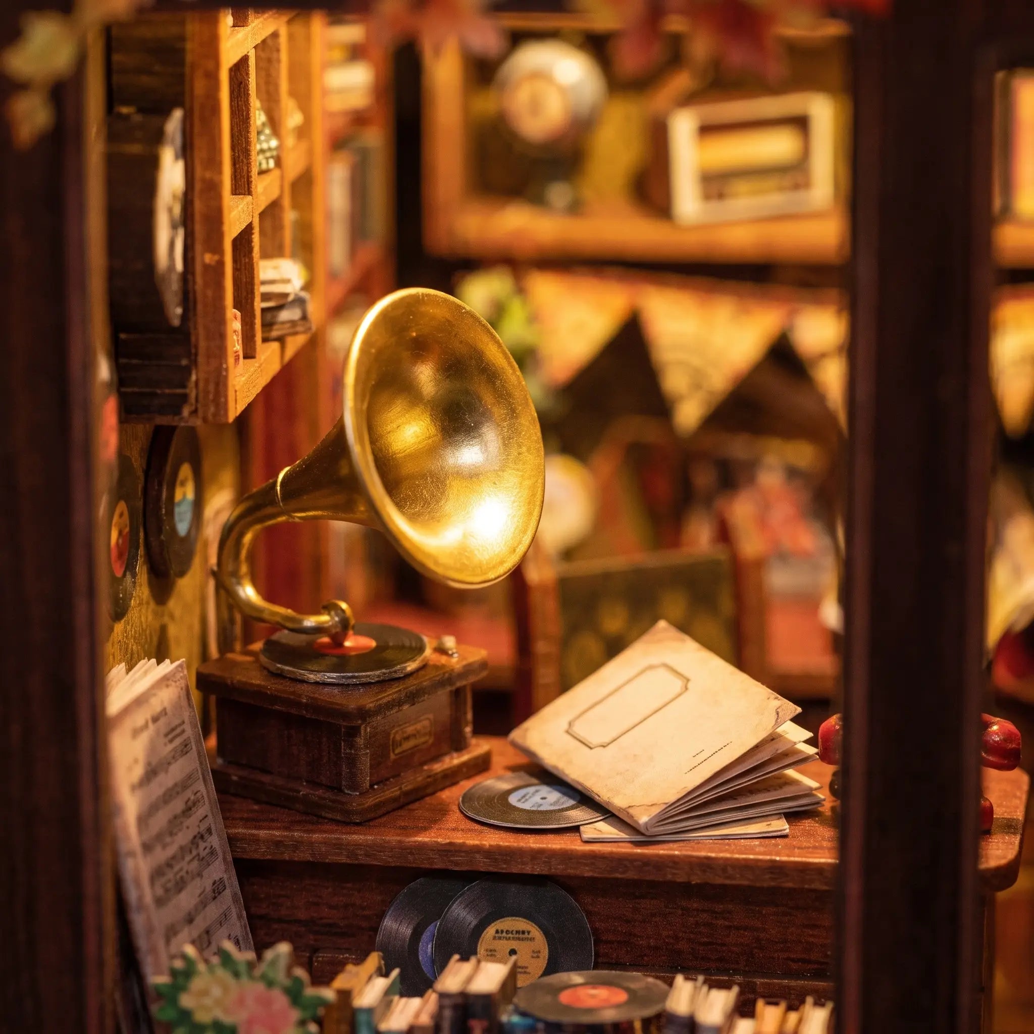 Detail of the brass-horn gramophone on the counter in The Record Shop book nook