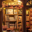 Detail of the wall shelves of records, sheet music and books in The Record Shop book nook