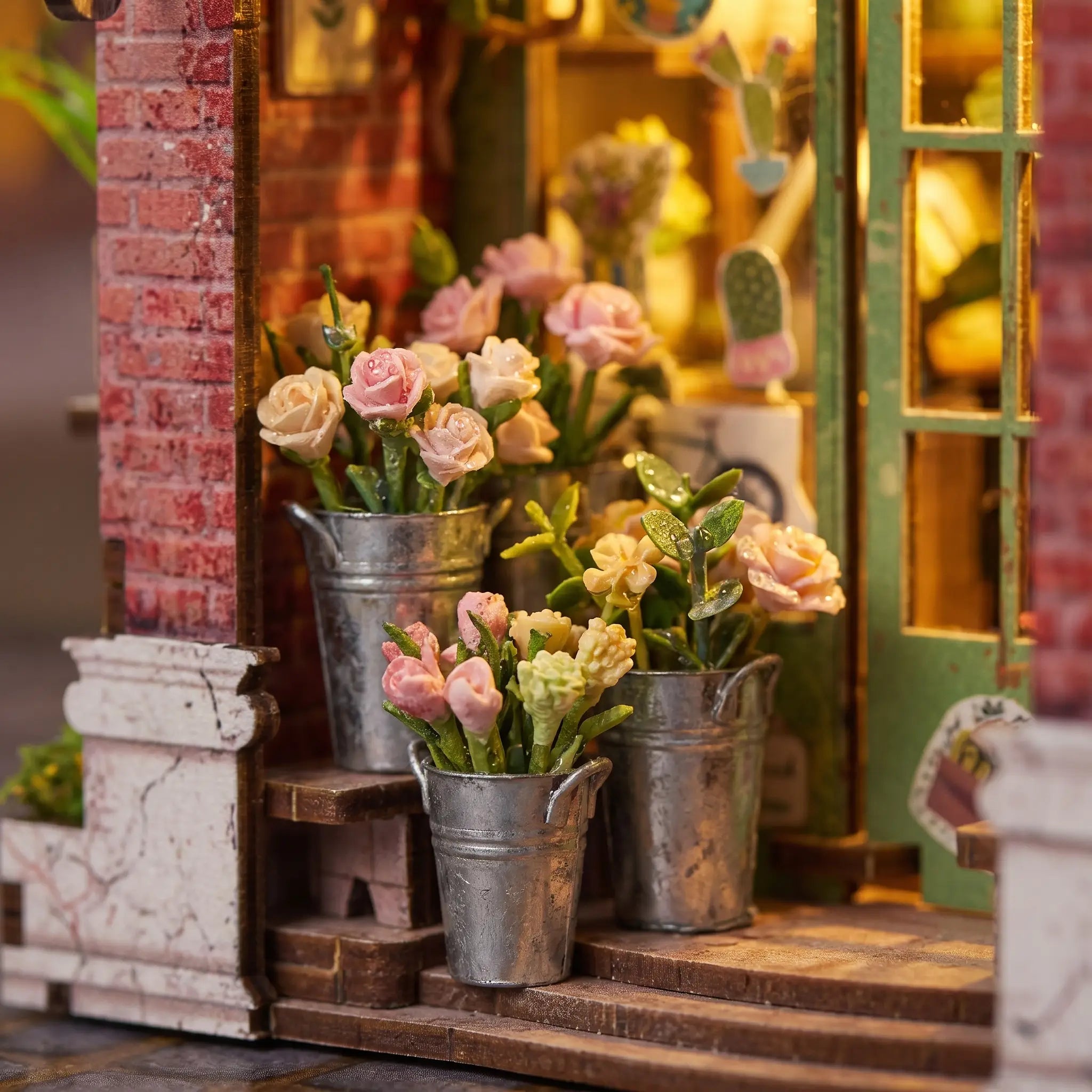 The Blossom House detail, galvanized buckets of fresh-cut flowers on the step