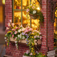 The Blossom House detail, window boxes overflowing with miniature blooms