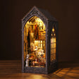 The Painter's Atelier gothic painting studio book nook on a dark walnut surface