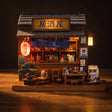The Sake House izakaya lit on a dark walnut backdrop