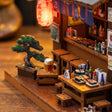 Close-up of the outdoor bar seating with beer and sushi
