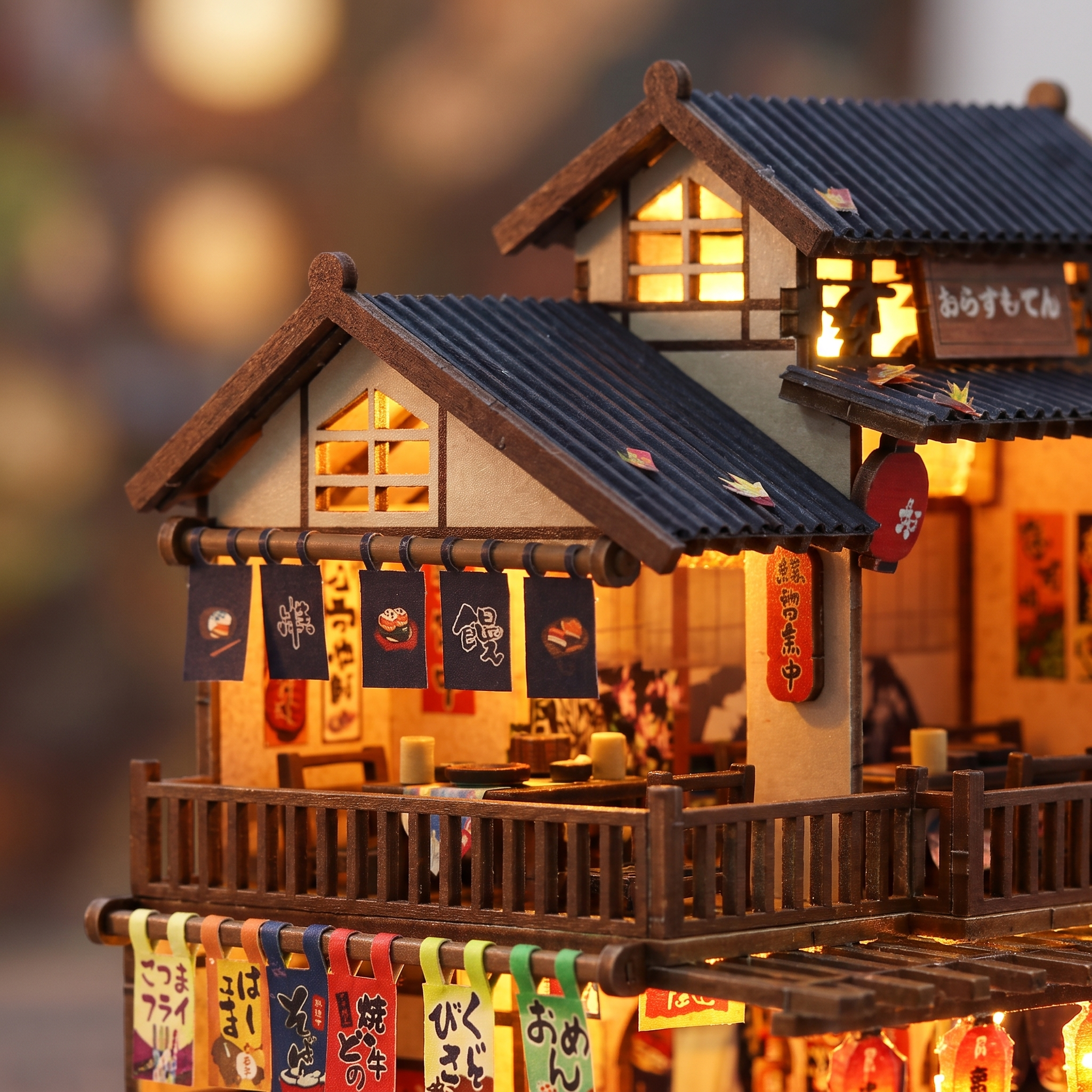 Close up of the upper story balcony and glowing shoji windows