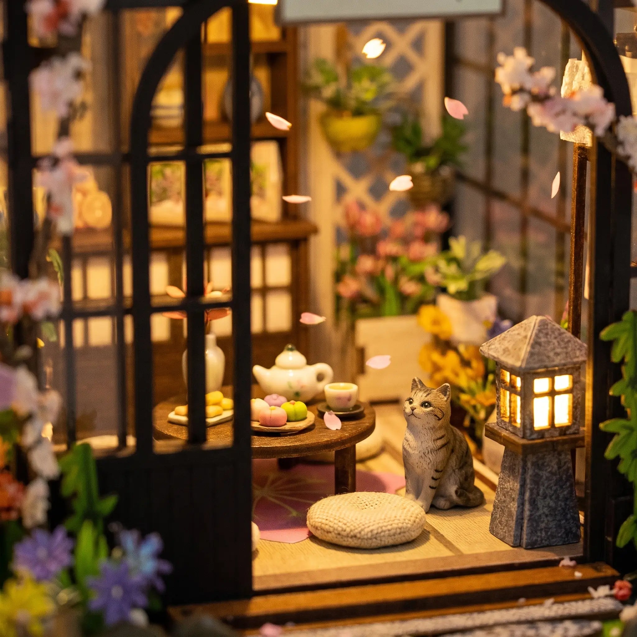 The Sakura Teahouse tea corner close-up with teapot and cat