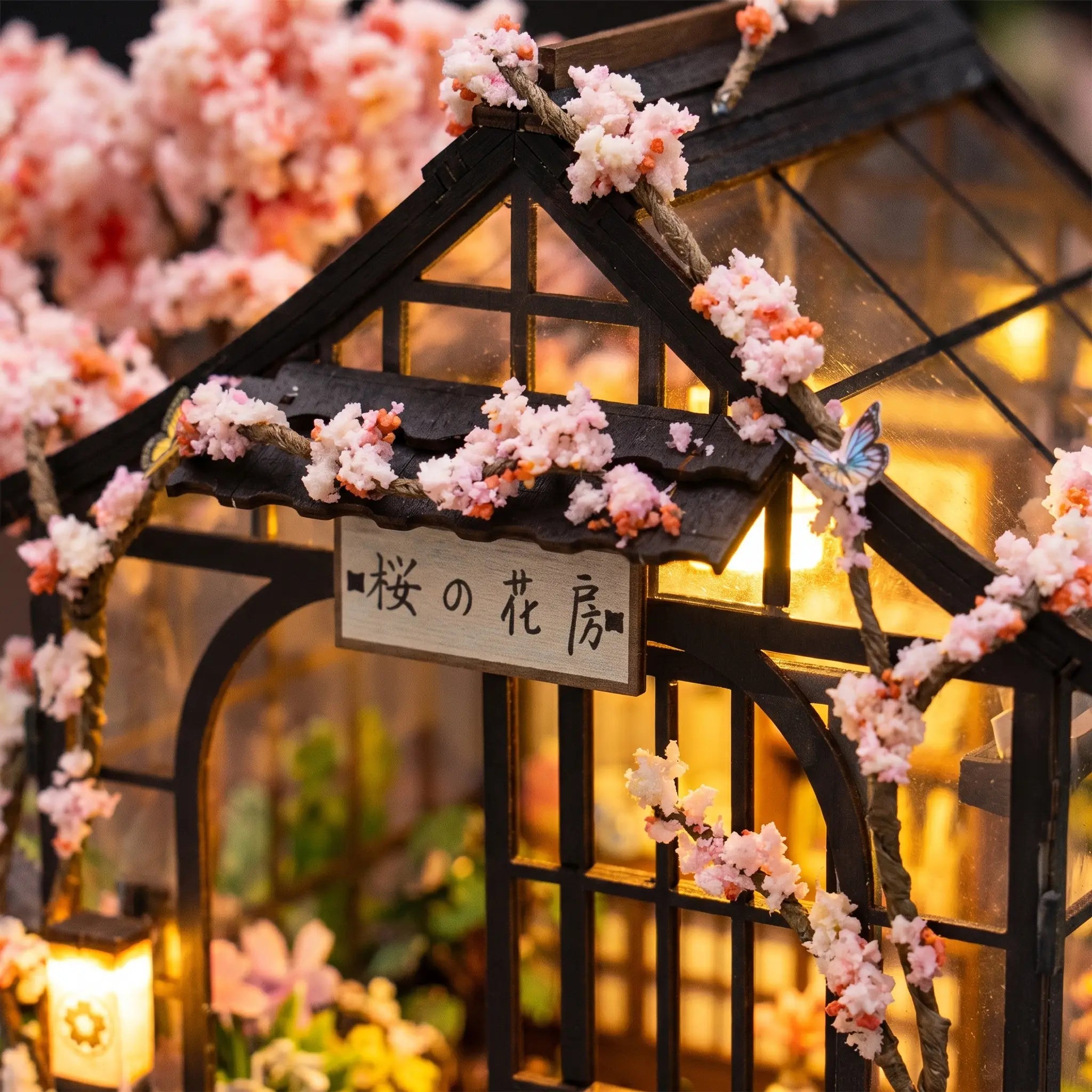 The Sakura Teahouse sign board and blossom gable detail
