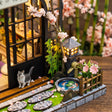 The Sakura Teahouse garden koi pond and bamboo spout detail