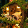 Close up of the quilted bed in the top floor bedroom under the moss roof