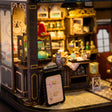 Close up of the counter with red hat, owl and menu board
