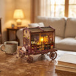 The Fortune Wagon on a cozy desk at dusk