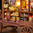 Apothecary drawers and mini books detail of The Fortune Wagon
