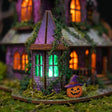 Green glowing corner lantern room detail of The Halloween Carnival