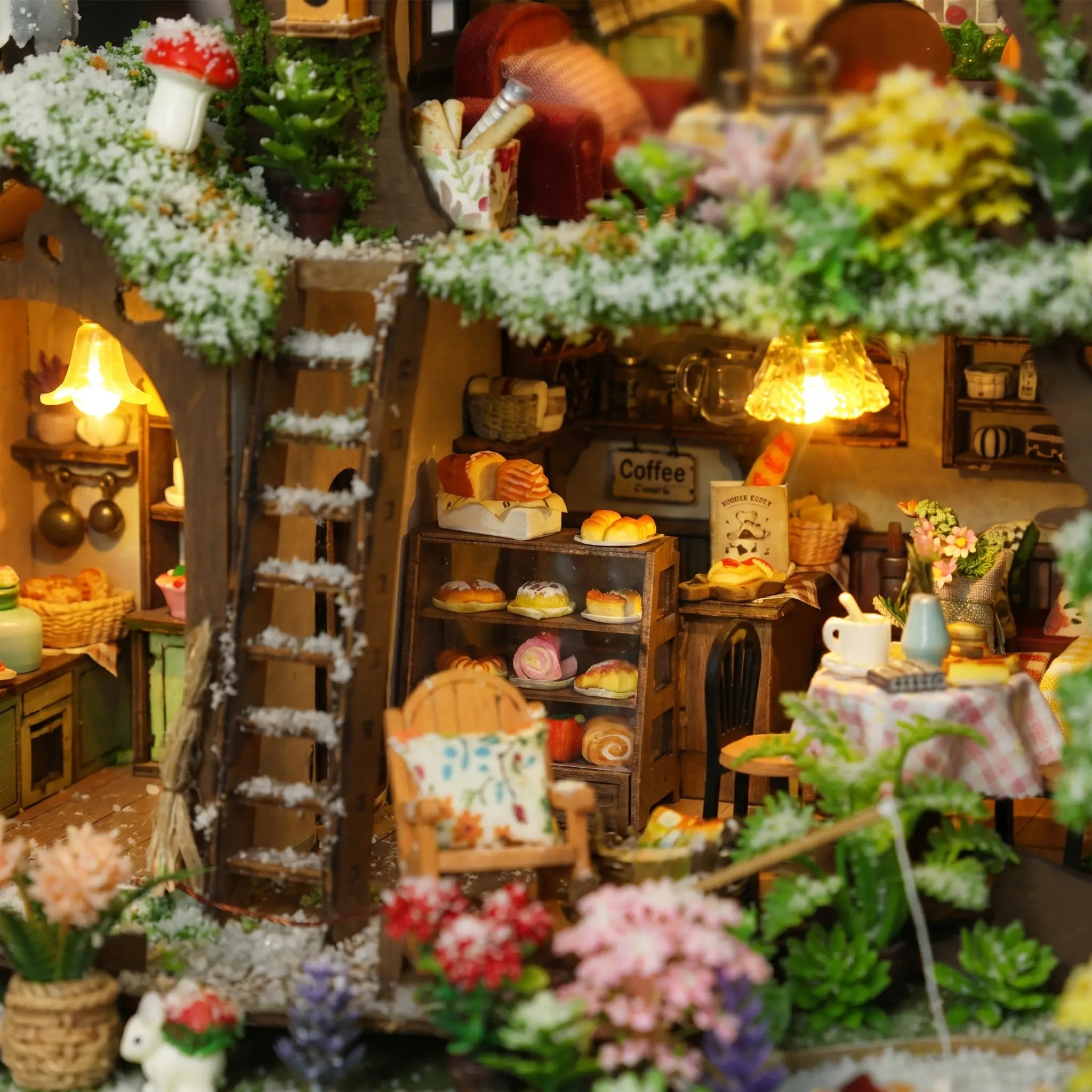 Close up of the ground floor bakery with cake cabinet and coffee sign under snow