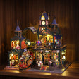 The Clocktower Emporium glowing on a dark walnut shelf at night