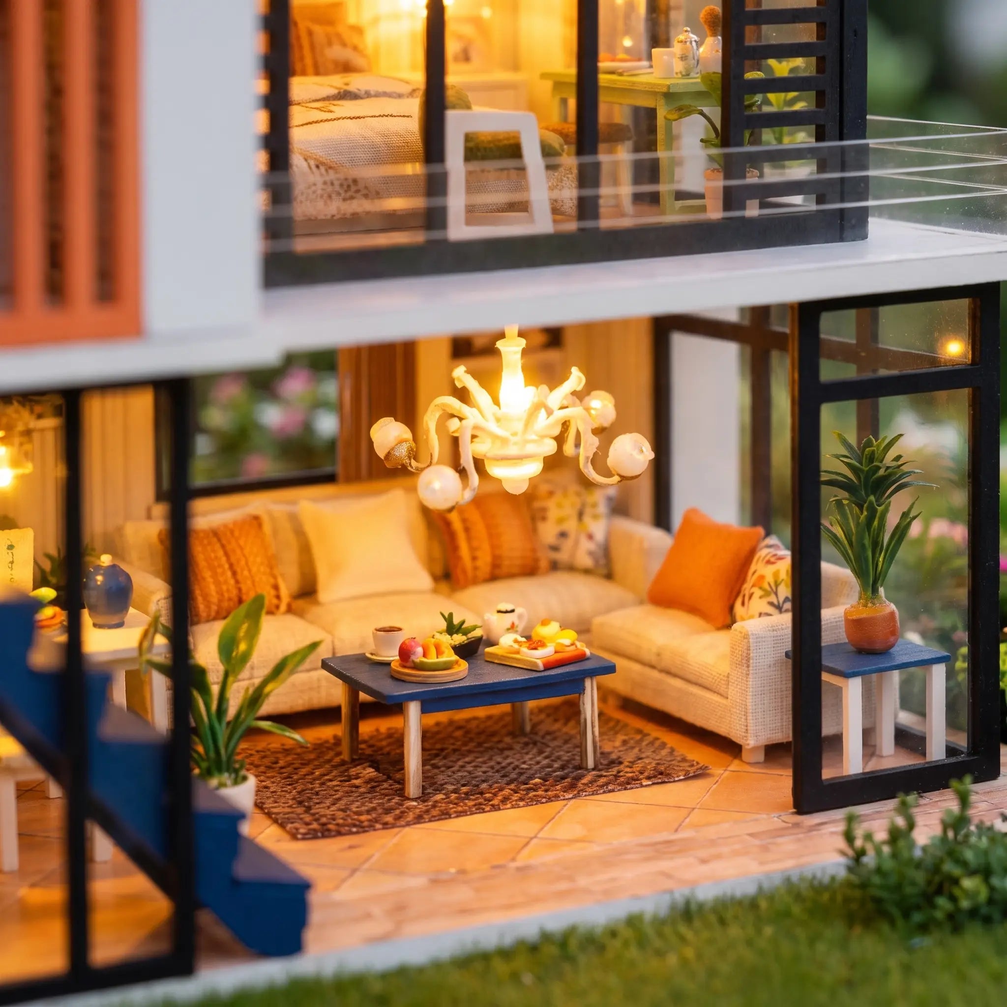 Close up of the living room with cream sofas and blue coffee table inside The Glass Villa