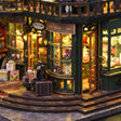 Close up of the curved gift shop bow window stacked with tiny toys