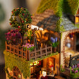 Close up of the rooftop terrace with telescope behind the picket fence