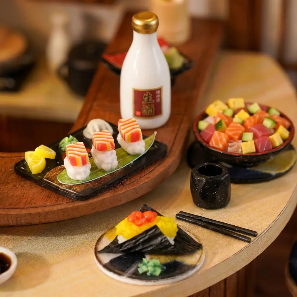 Detail of the sushi counter: salmon nigiri, chirashi bowl and sake bottle
