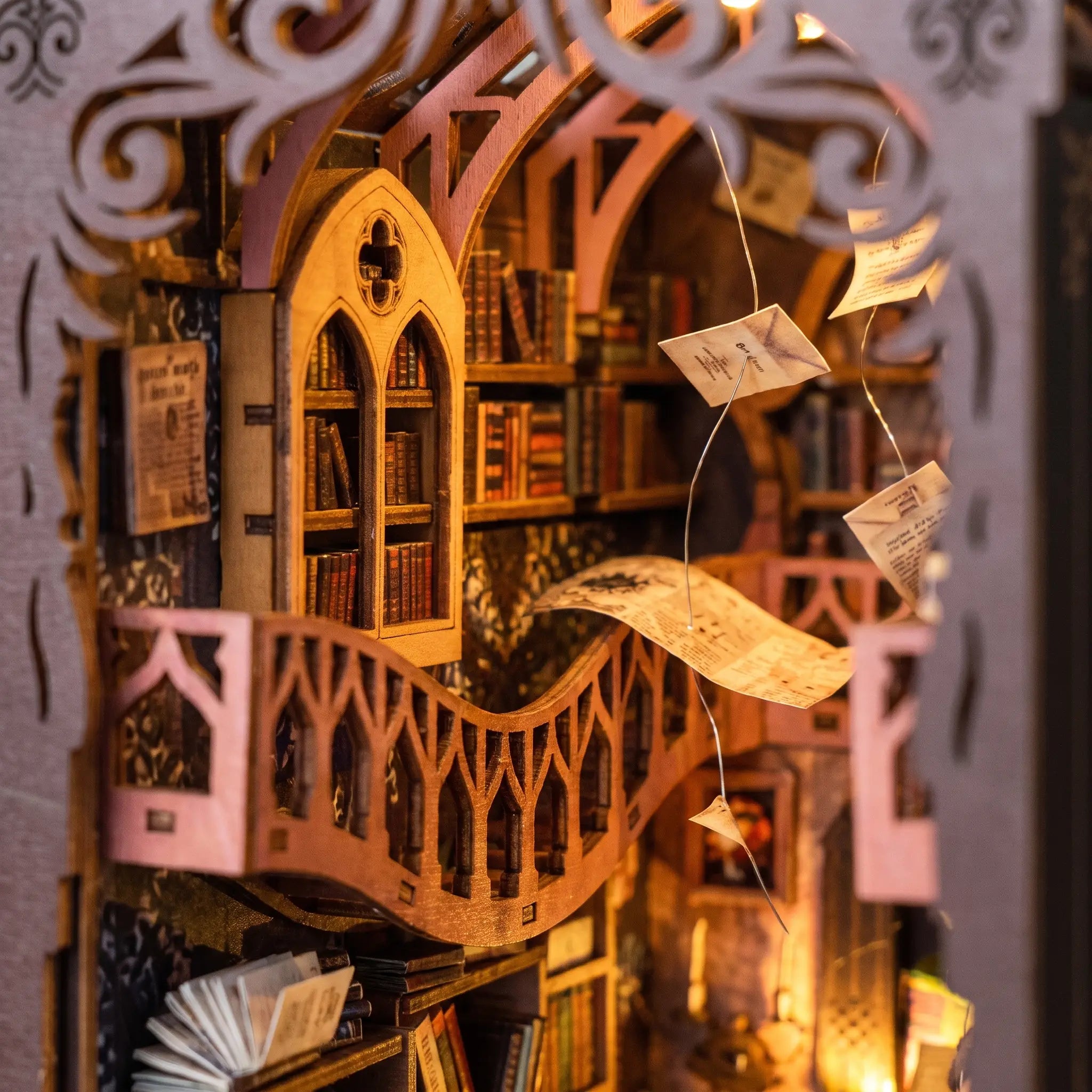 Macro detail of the gothic balcony, arched bookshelves and flying letters inside The Sorcerer's Archive