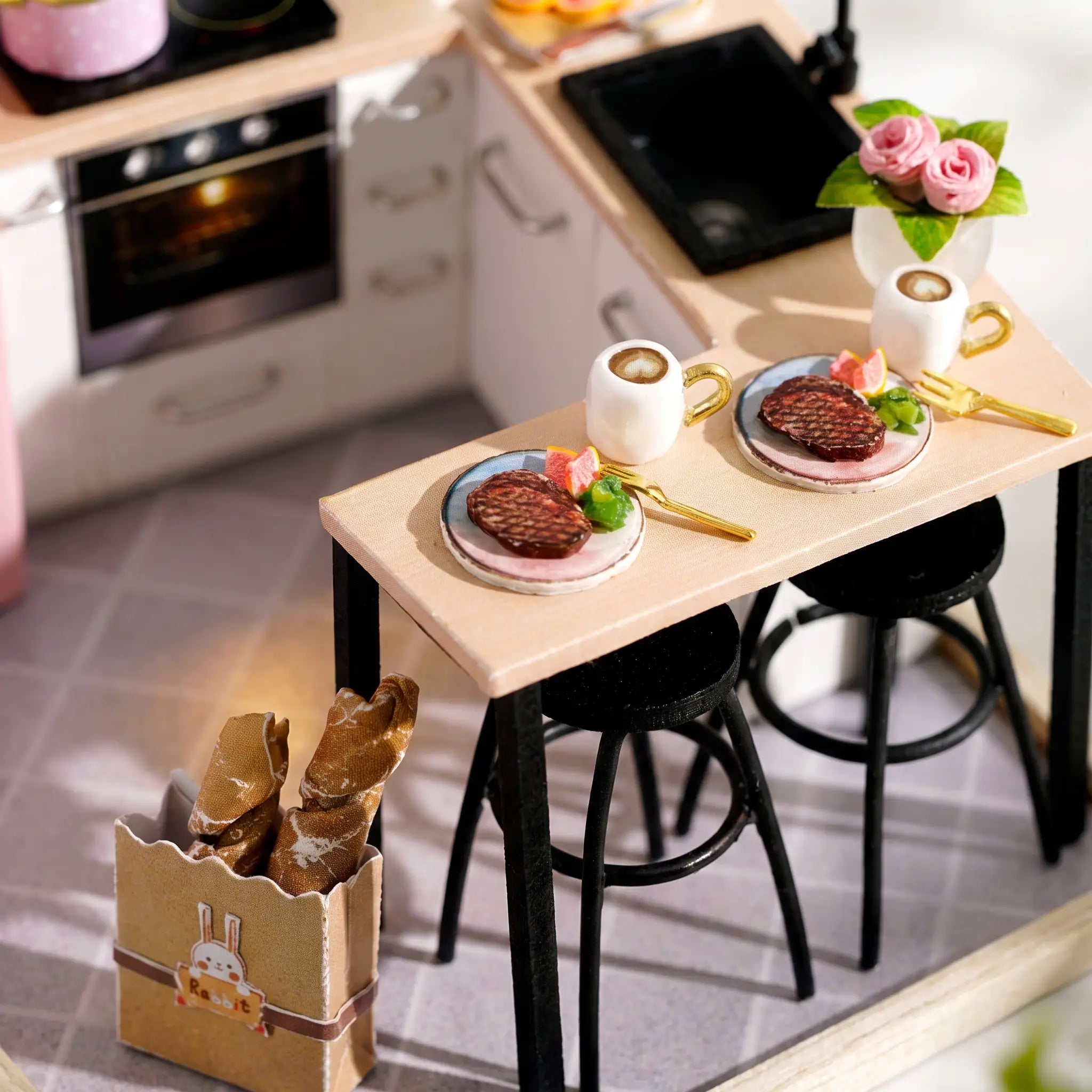 Macro detail of the breakfast bar with plates, lattes and roses inside The Breakfast Bar kit