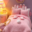 Macro detail of the plush pink bed with bunny-ear pillows inside The Cottontail Room kit