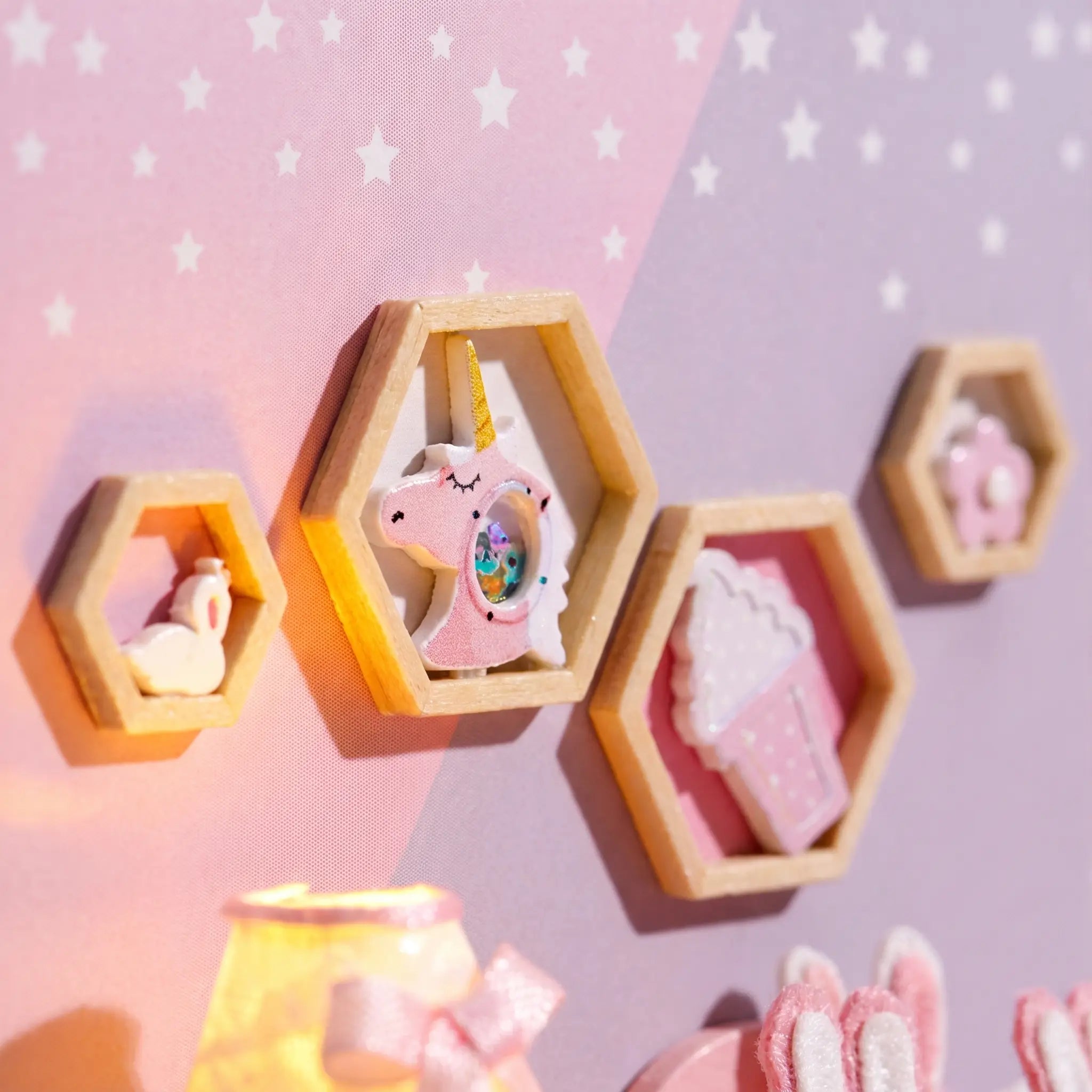 Macro detail of the hexagon shelves on the star wall inside The Cottontail Room kit