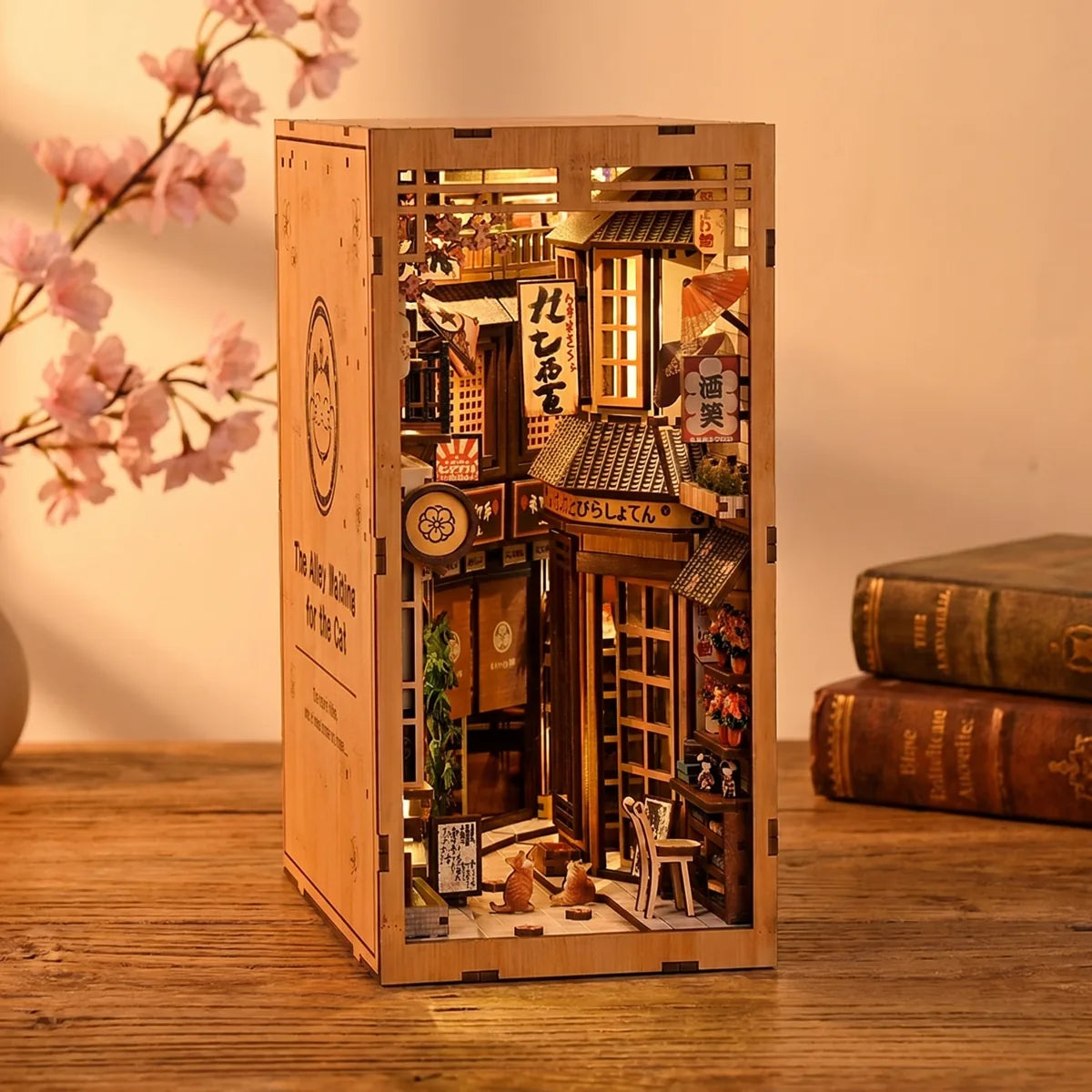 The Cat's Alley DIY book nook, a lit Japanese alley with cherry blossom and cats