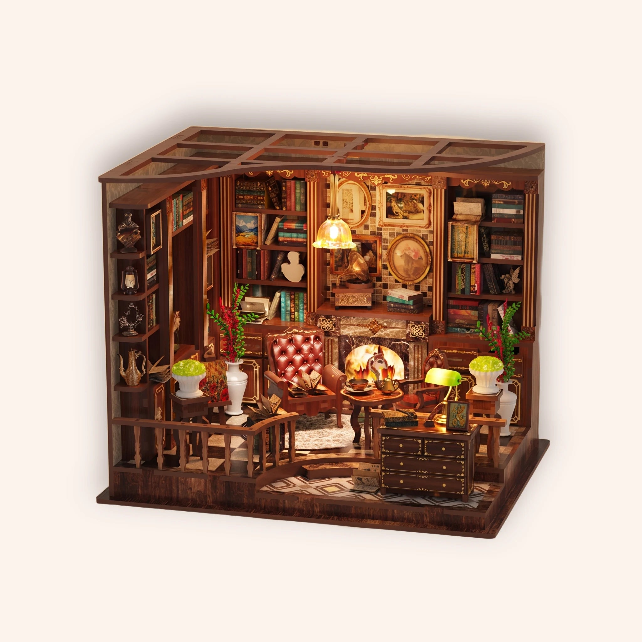 The Left Bank Study miniature Parisian study roombox on a soft cream background, warm interior lighting