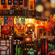 Close up of the lit teahouse counter and hanging lanterns