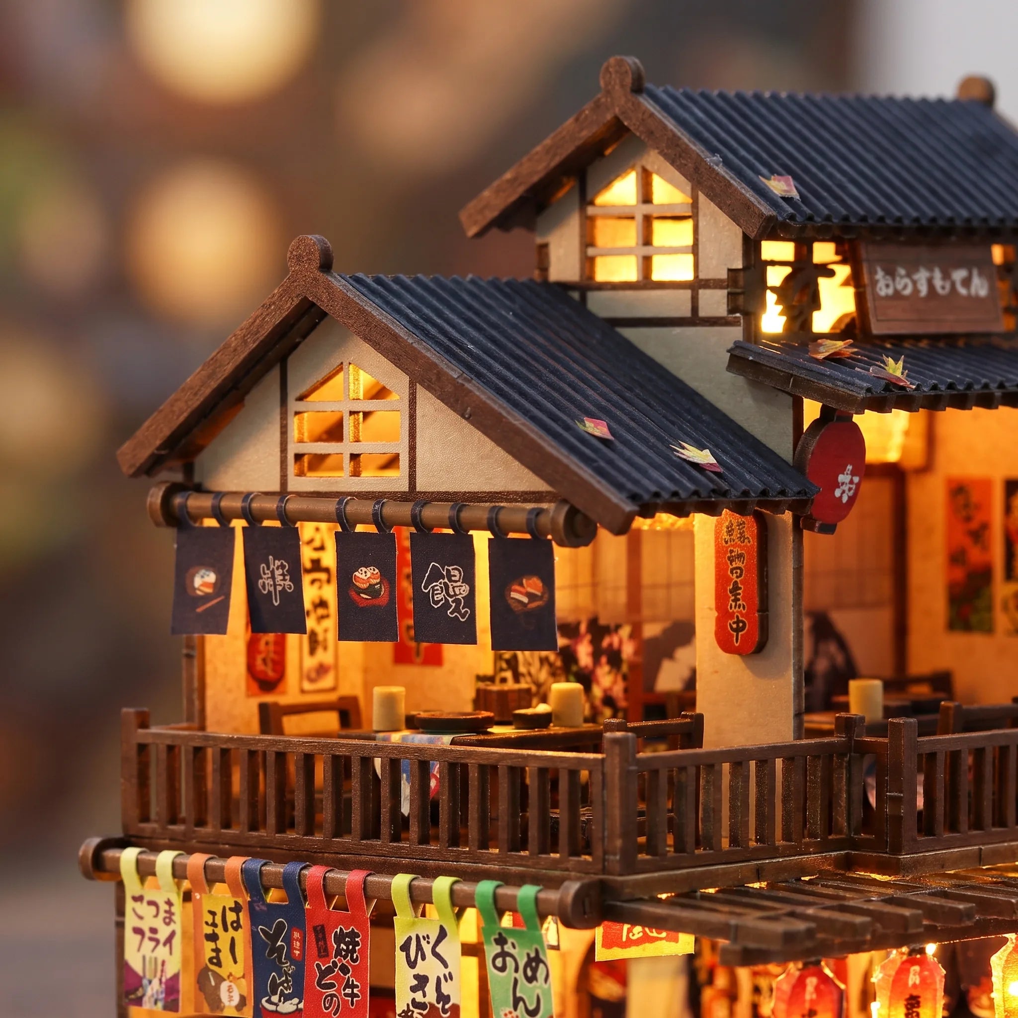 Close up of the upper story balcony and glowing shoji windows