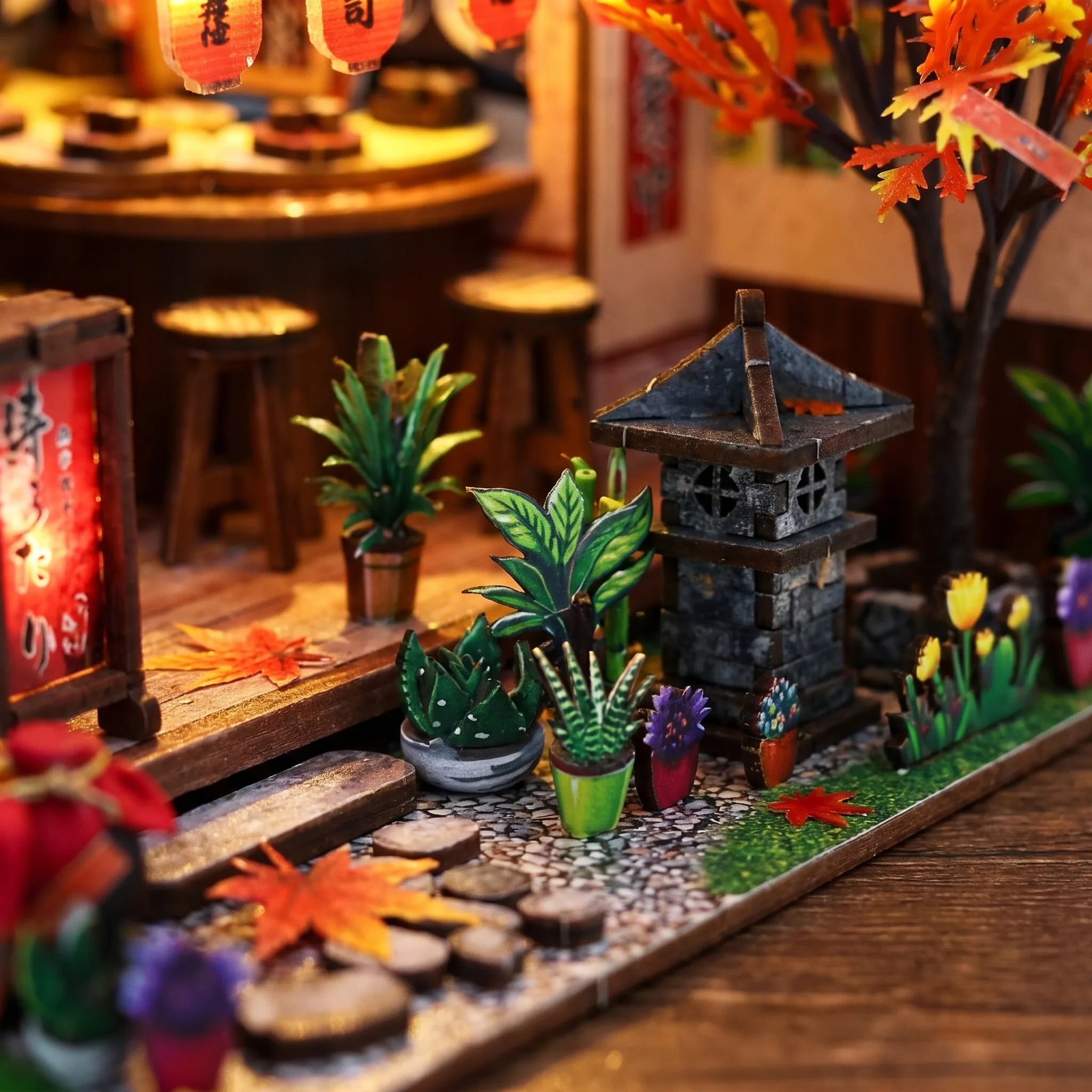 Close up of the front garden with stone lantern and plants