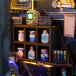 Lab shelf detail: serum bottles, terminal screen and digital meter