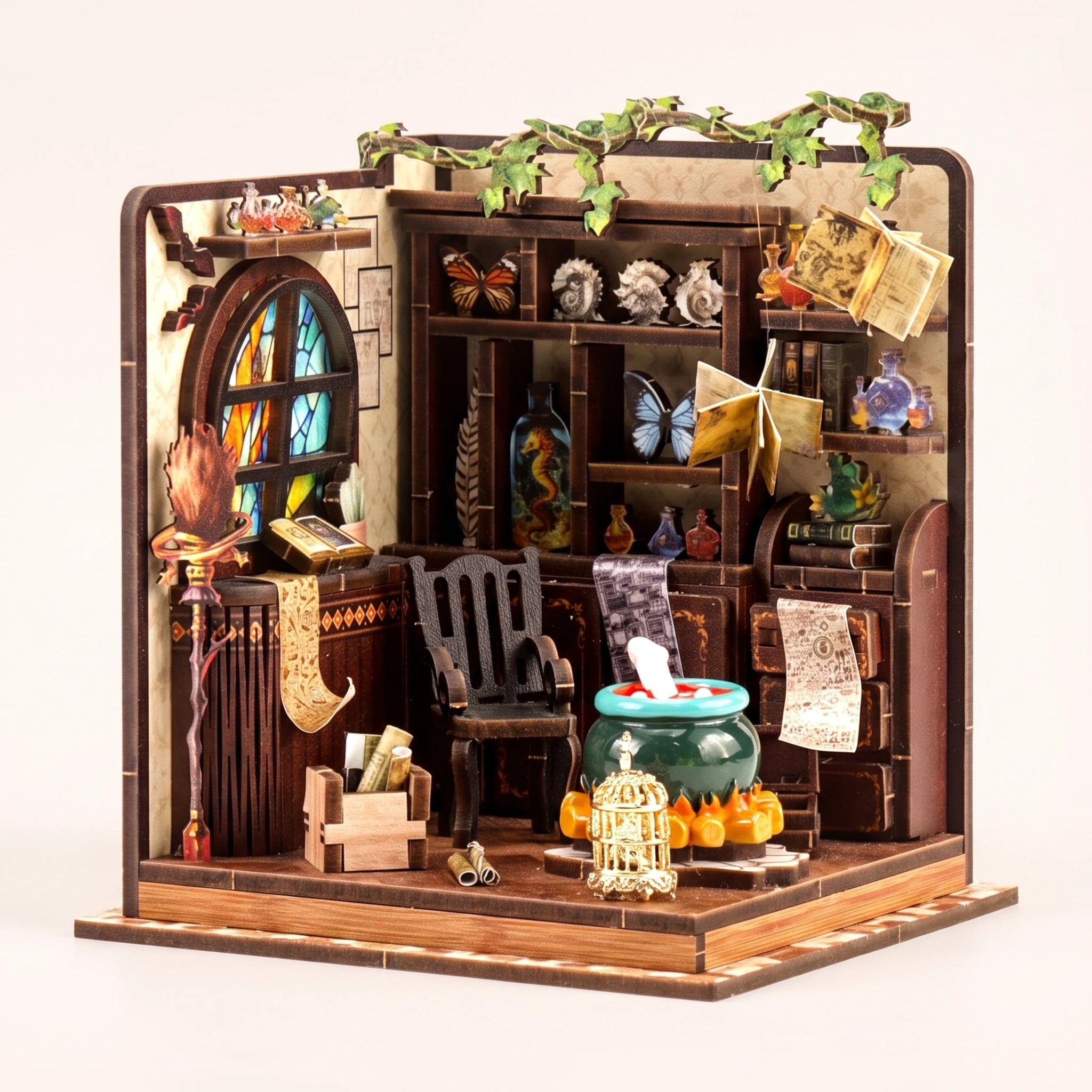 The Potion Workshop miniature roombox on a soft cream background