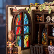 Close up of the coloured arched window panels in The Potion Workshop